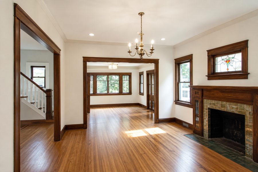 Cerpa Construction LLC finished deep house restoration with refinished floors repaired walls restored trim updated lighting and preserved character.