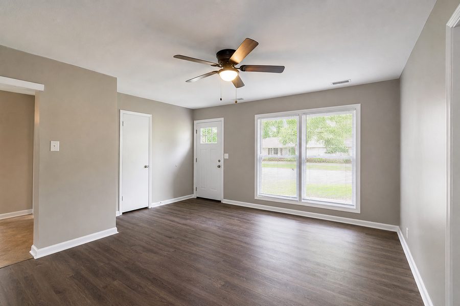 Cerpa Construction LLC finished fix up renovation with repaired drywall fresh paint new flooring updated lighting trim and doors.