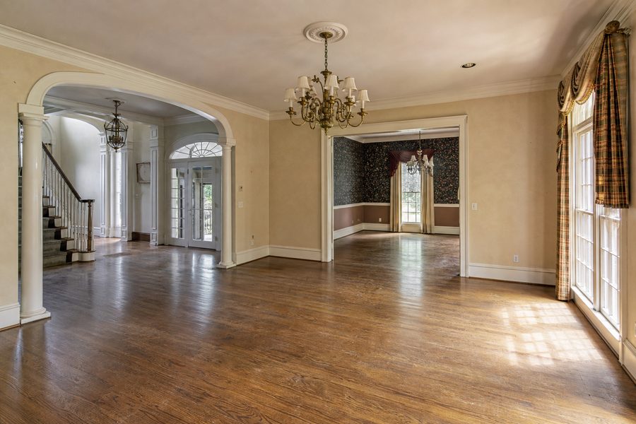 Before high end house renovation showing dated interior floors trim windows paint and lighting for Cerpa Construction LLC upgrades.