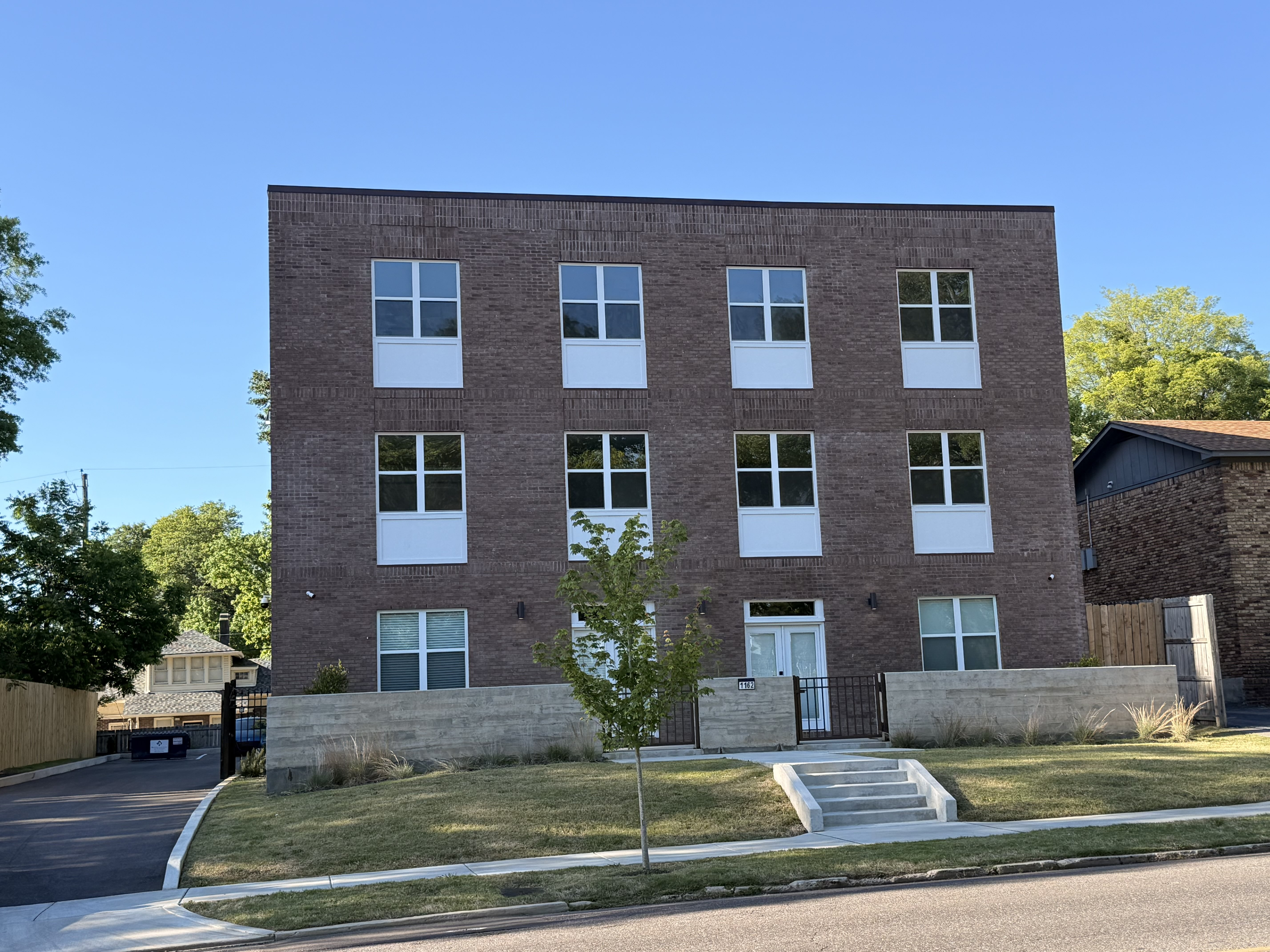 1162 Peabody – Exterior siding and brick in progress
